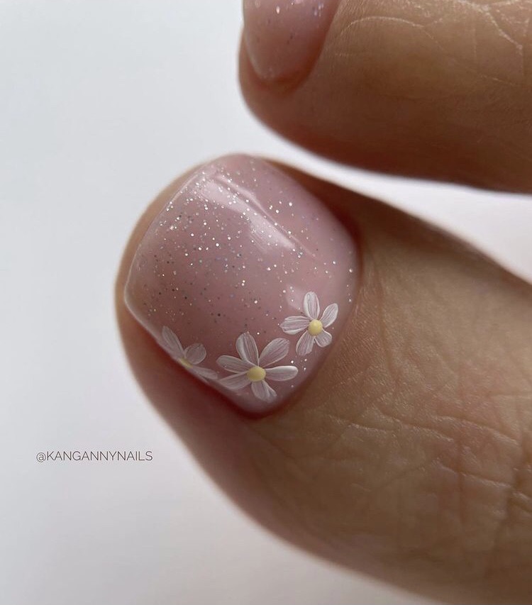 Tiny flower toe nail designs