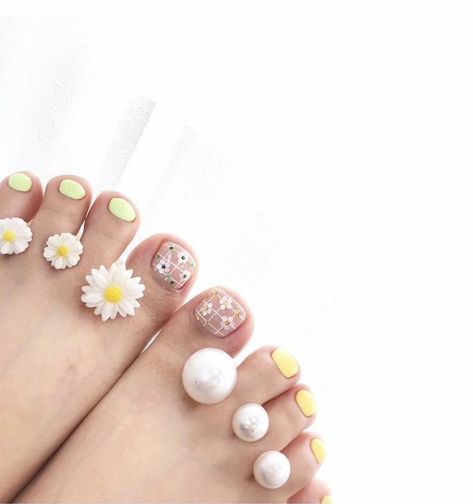 Pastel flower toe nail designs