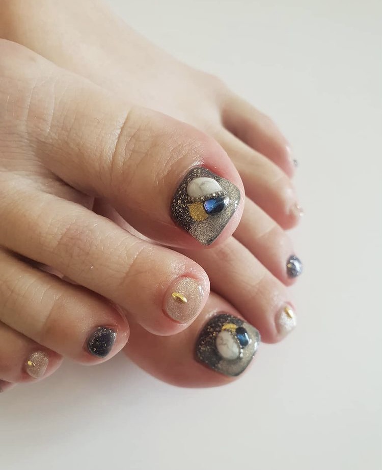 Blue and black toe nail designs