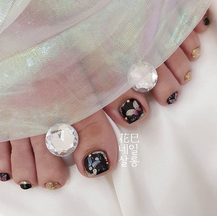Butterfly black toe nail designs
